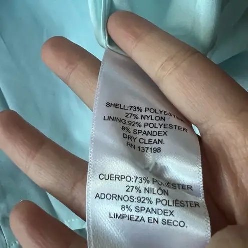 We Wore What Light blue puff sleeve dress with rhinestone buttons