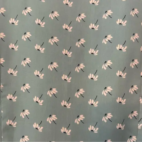 ⭐️Romy light teal blue sleeveless blouse with dandelion print and ruffles medium