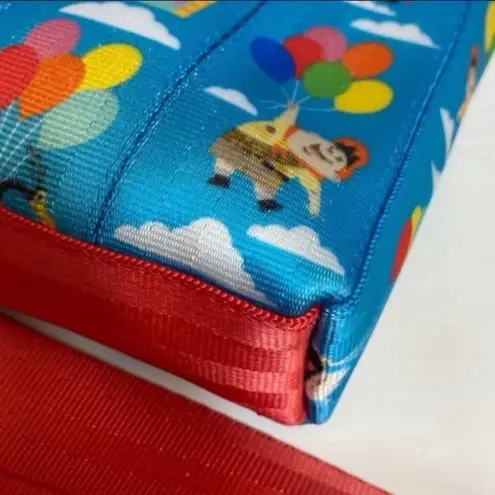Disney Parks x Harvey’s Pixar UP! Character AOP convertible crossbody Blue