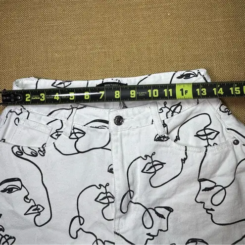 Missguided white denim shorts with a black abstract face line art print Size 4