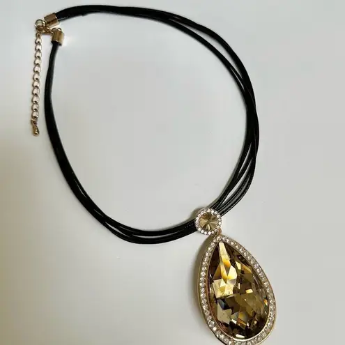 Rhinestone teardrop pendant necklace on multi Cord