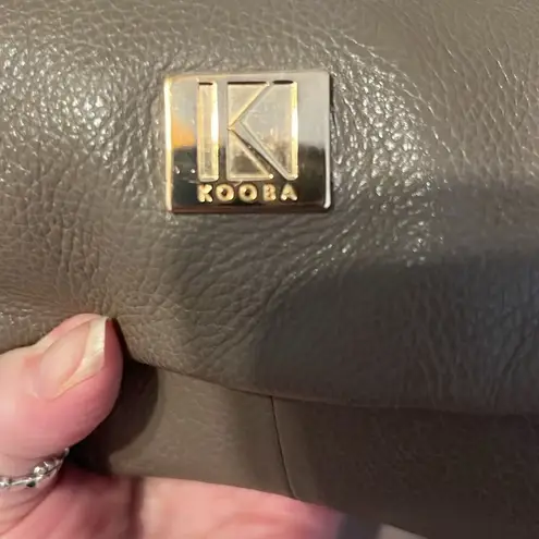Kooba NWT large roomy lots of pockets expandable zip close satchel in taupe