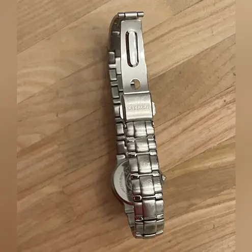 Citizen Eco-Drive Ladies Watch Black Dial WR100 Date Window Stainless Bracelet