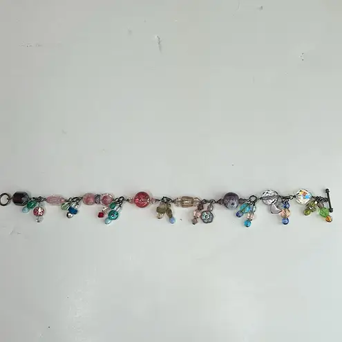 Handmade pink and purple fairycore bracelet glass and crystal dangling beads