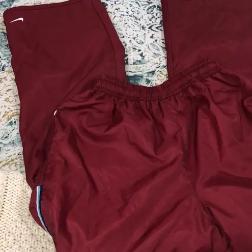 Nike  size medium burgundy track pants/joggers