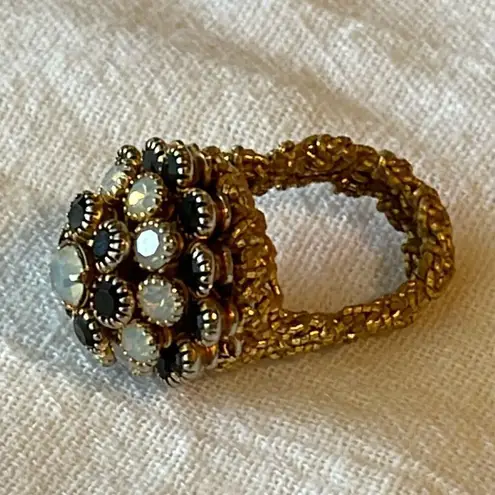 Vintage designer dome ring in black and milky cut glass.