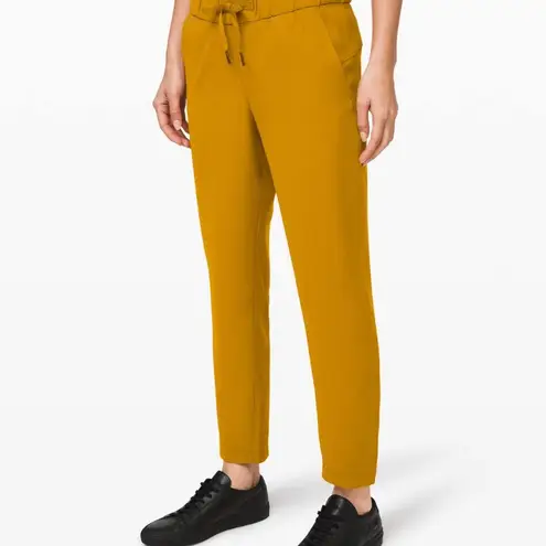 Lululemon  On the Fly 7/8 Pant Woven in Fools Gold Size 4 - Image 9