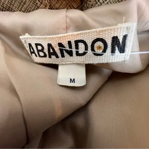 Abandon Size Medium Italian Shine Coated Leather In a Caramel Color w/Pockets Tan