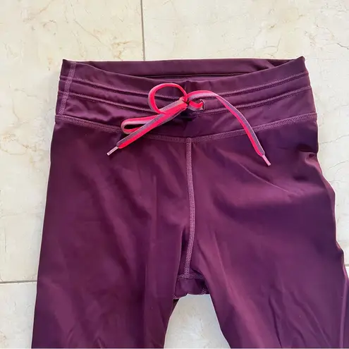 The Upside NWOT Neon Striped Retro Leggings Sz 4 Purple