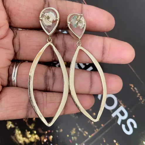 Tear Drop Oval Earrings With Heart Shaped Pink Stone