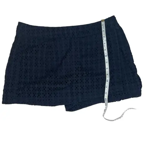 CAbi  100% cotton navy eyelet skort with side zip closure; style# 5111; size 6