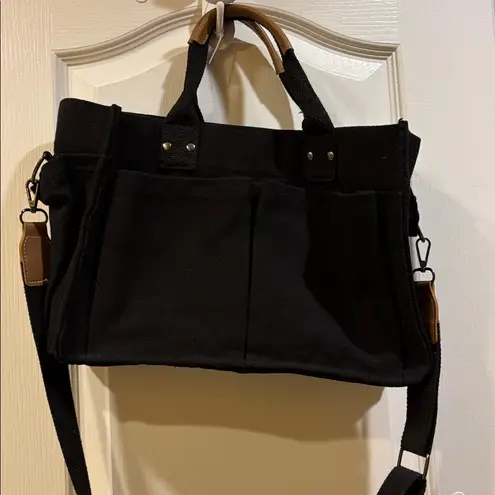 Black Canvas Tote Bag Brown Accents Detachable Strap 6 Pockets Outside on Bag