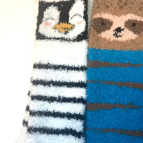 Set of 3 fuzzy socks featuring a penguin, raccoon, and sloth design animal print socks Multiple