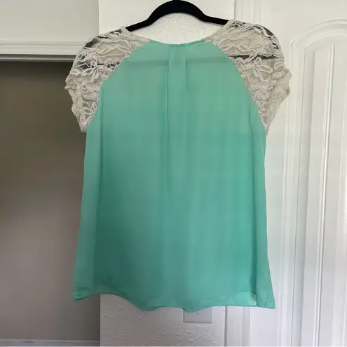 Charming Charlie  size Large Teal and white blouse