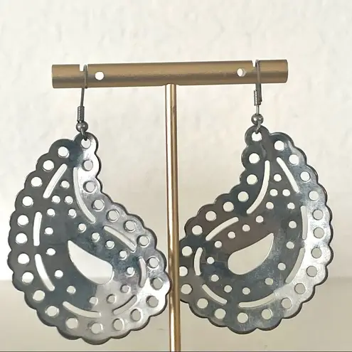 Silver tone paisley statement earrings