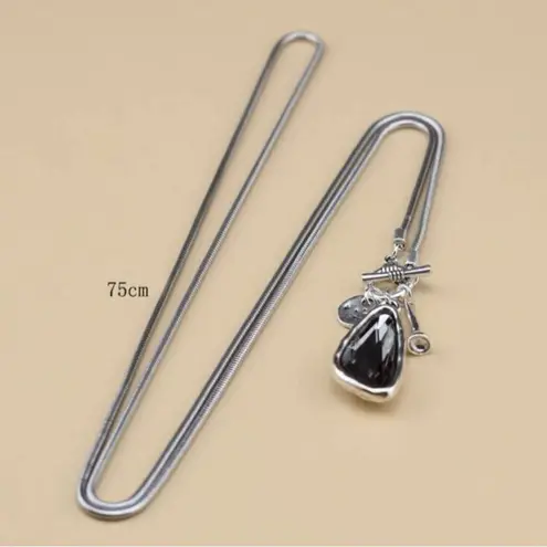 Silver 36" Long Faced Cristal Sweater
Necklace Black