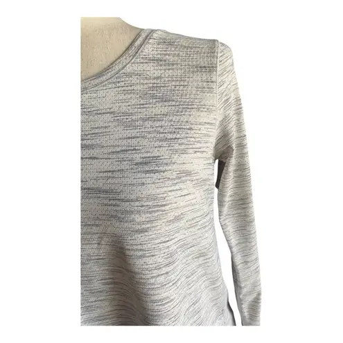 Zyia -ACTIVE TOP WITH OPEN BACK-SIZE SMALL Grey heathered open back active top, has thumbholes and reflectors on wrist, has no tags, long sleeves, 94% polyester and 6% spandex, excellent condition  Measurements: Bust: armpit to armpit 17 inches  Length: shoulder seam to bottom 22 inches