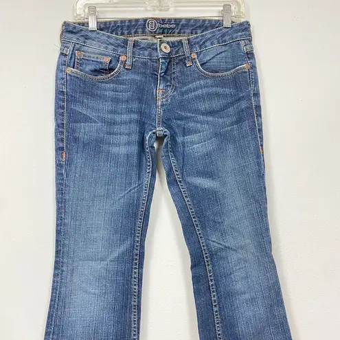 Bebe  EWomens Dark Wash Blue Denim Bootcut Low Rise Pants size 28 FLAWED