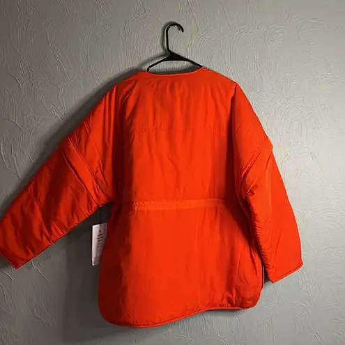 Lululemon  Insulated convertible jacket size L in solar orange