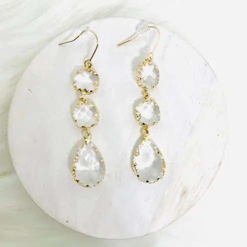 The Crystal Dangling Bezel Duo