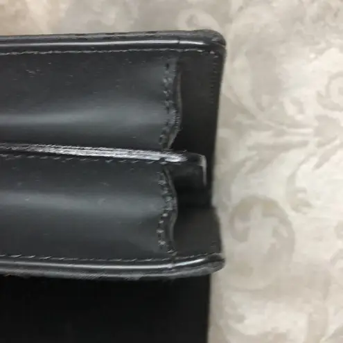 Gucci  Handbag with retractable hand strap.  One owner.  Excellent condition.