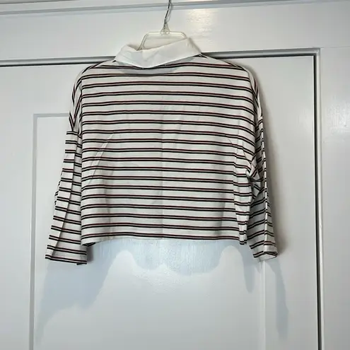 Don’t ask why brand crop top shirt. One size fits most. Brown