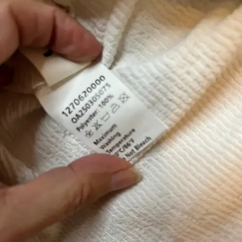 COMMENSE White Textured V Neck Sleeveless Peplum Top Black Bow Accent Size XS