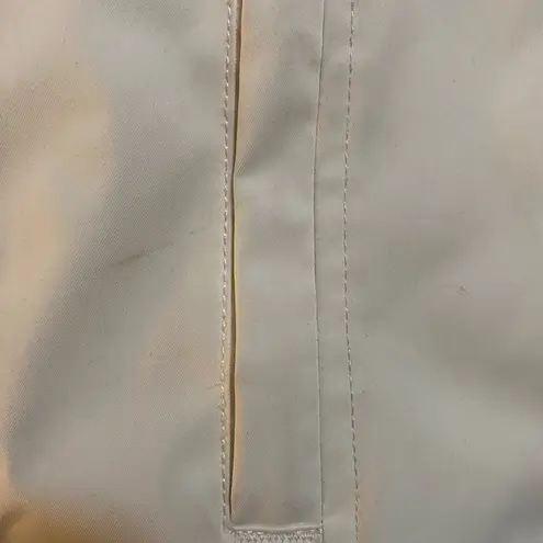 Stylish NILS insulated white ski jacket with custom metal accents Size 10P