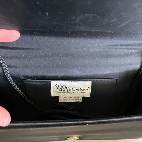 Edgy Black and Gold Skull Clutch