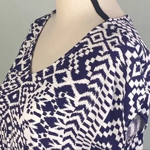 Skies Are Blue navy and white top with back cut-outs in size Medium. EUC