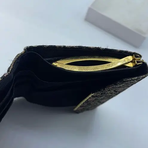 Vintage Larcazy, 230.Ruede Rivoli, Paris brocade wallet. Gold