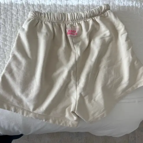 Daily Drills  Sweat Shorts in Sand with Pink Patch