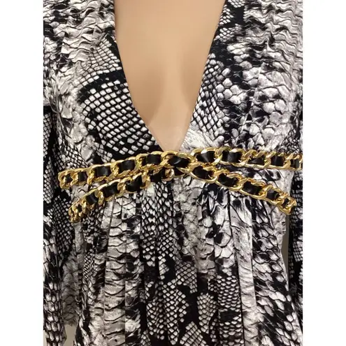 New. SKY snake print plunge neck top with chain detail. Retails $189 Black Size M