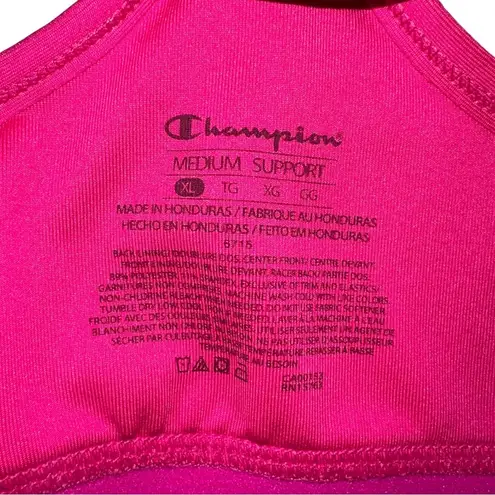 Champion  sports bra size medium a racerback style and a wide band at the back