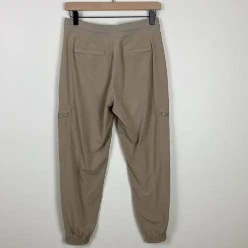 Athleta  Go Far Travel Pant Joggers Tan Women’s Size 2 Petite Work Casual Cargo