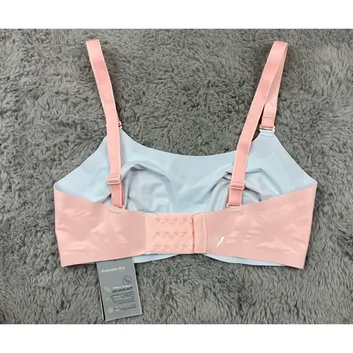 Knix evolution bra in powder pink/ Blue ice Size 6