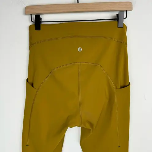 Lululemon  Power Thru High Rise Leggings Sz 8 Gold Spice Side Pockets