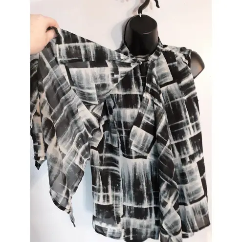 Prologue sleeveless waterfall blouse