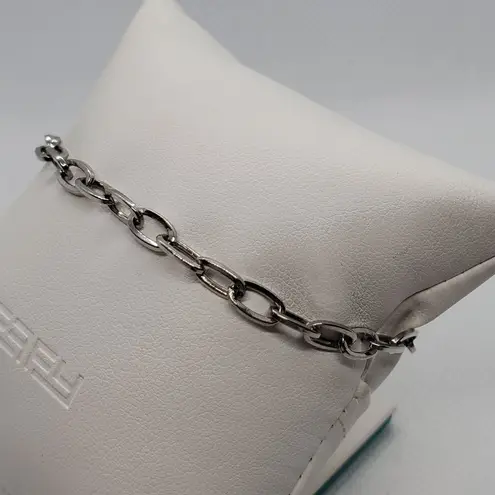 High Intensity Silver Tone Chain Charm Bracelet