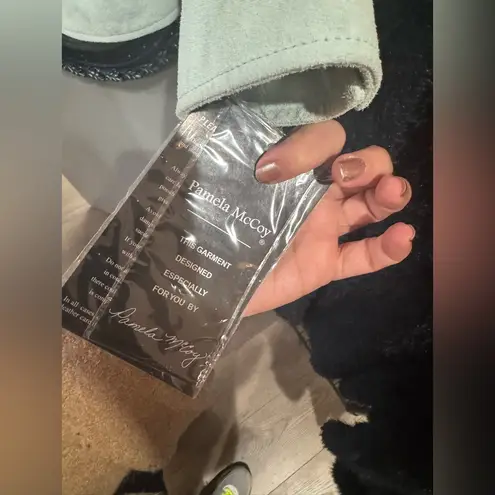 Pamela McCoy Women's Jacket. Light shade of green. Think mint. Green Size XS