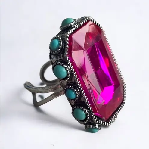 Pink crystal adjustable ring with round turquoise accents on sides