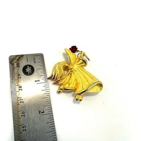 Tara vintage gold tone angel brooch with a rose pin