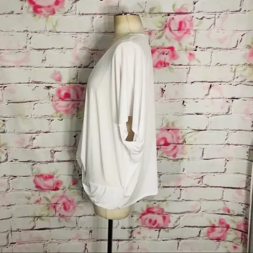 Eloquii white short sleeve twist front casual top