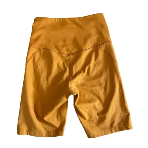 Girlfriend Collective  High-Rise Bike Short in Yellow/ Orange Size XS X-Small