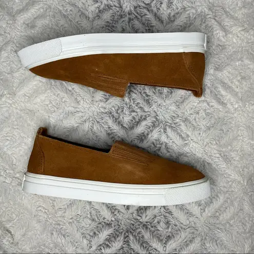 Minnetonka  Women's Gabi Suede Round Toe Slip-Ons in Brown