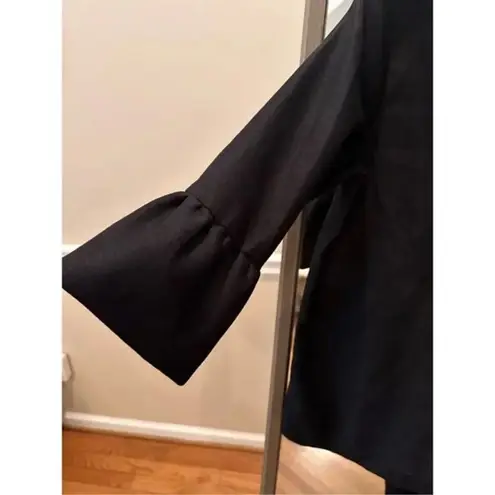 Stylish Ces Femme black top featuring bell sleeves, Size Medium