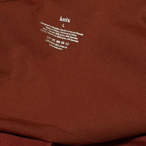 Knix luxelift bodysuit with adjustable straps built in wireless support Large Red