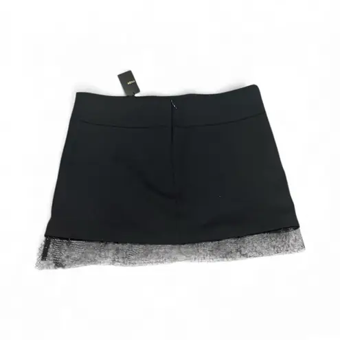 Maje Anthro black wool blend mini skirt with tulle mesh hemline size 38 medium