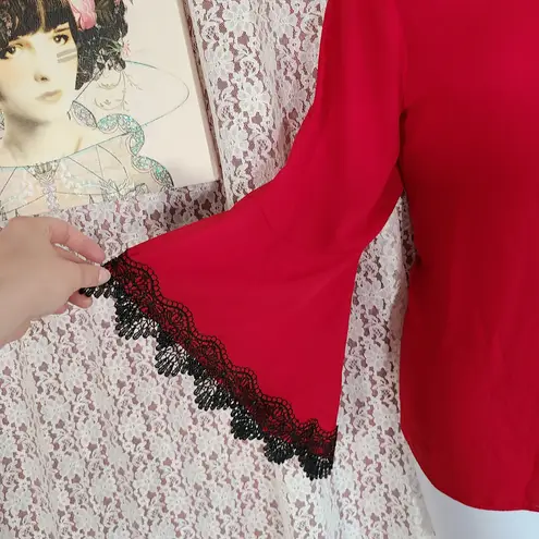 Est. 1946  red black bell sleeve blouse with lace detail