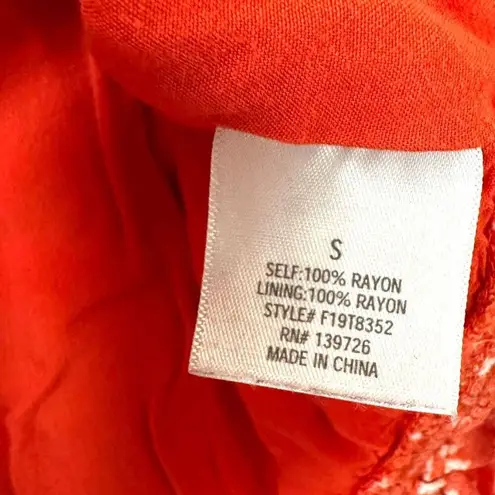 Harper burnt orange floral short sleeved V neck crop top